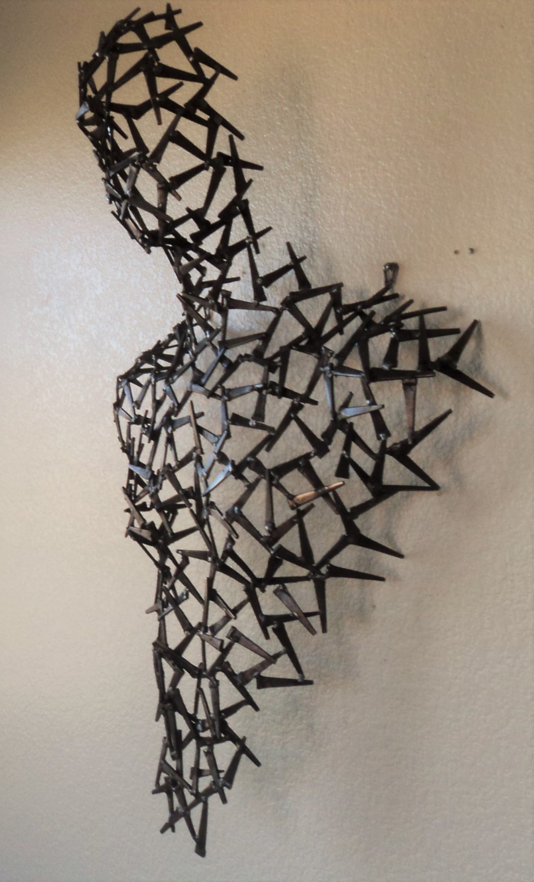 Apollo II - masculine figurative metal sculpture by Corey Ellis