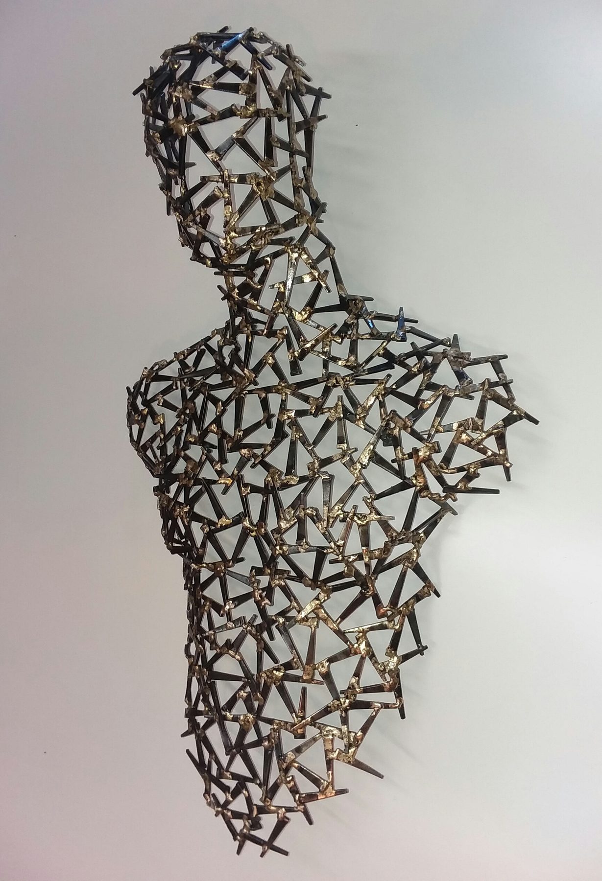 Bronze Age - figurative bronze-toned metal sculpture by Corey Ellis