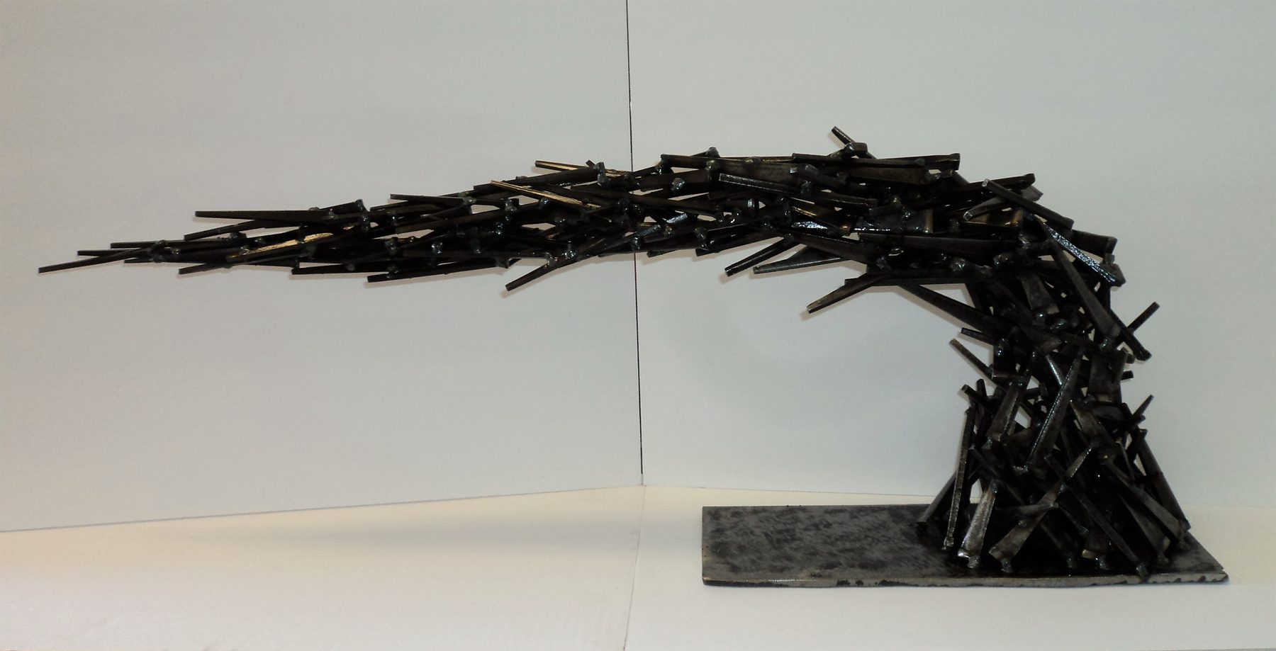 Oxidized brutalist welded steel sculpture