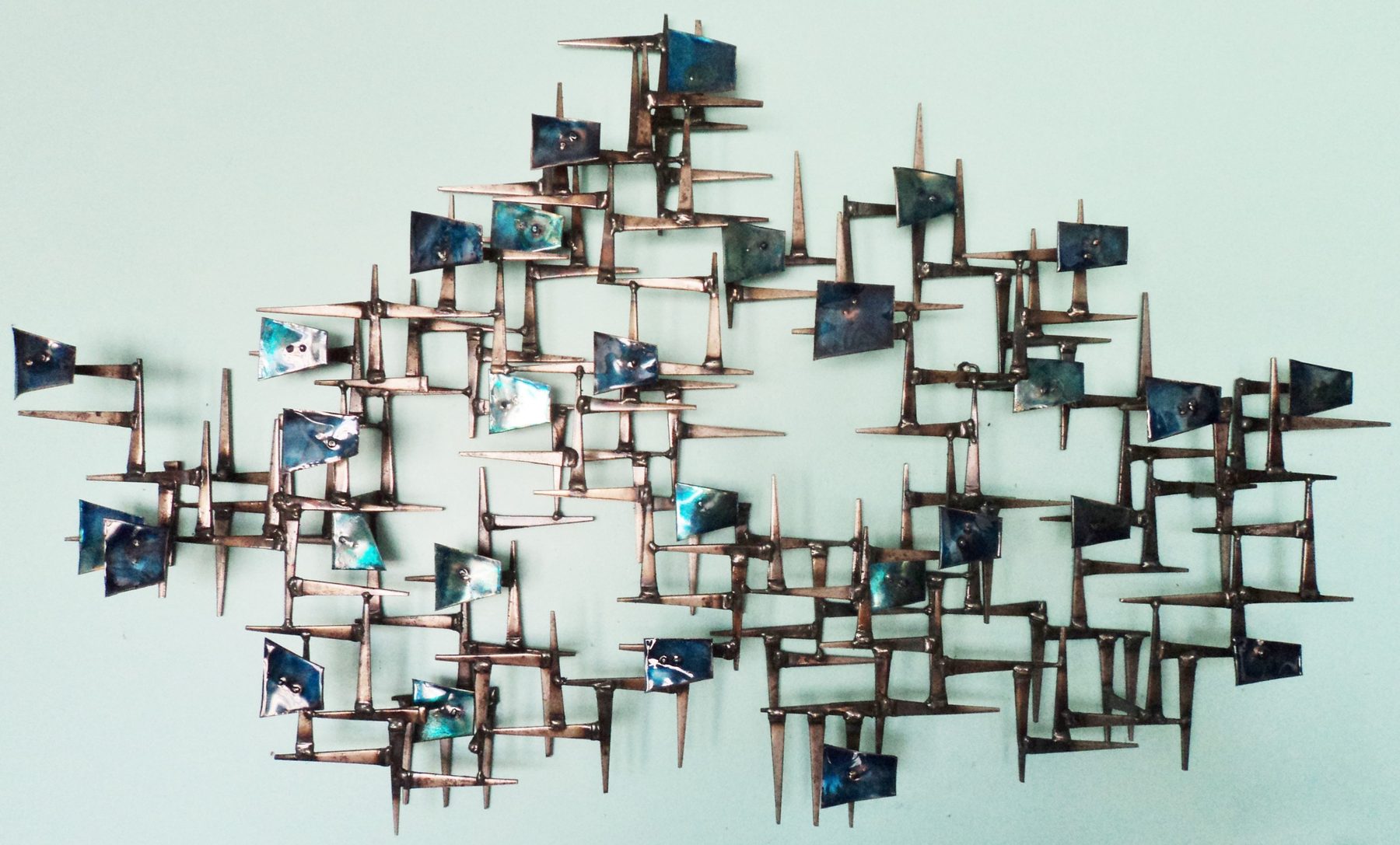 Mid-century welded steel wall sculpture by Corey Ellis