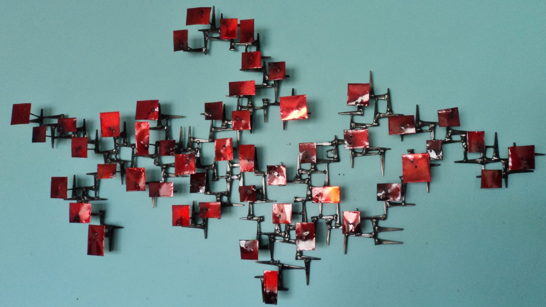 Red and copper mid-century welded forest sculpture by Corey Ellis