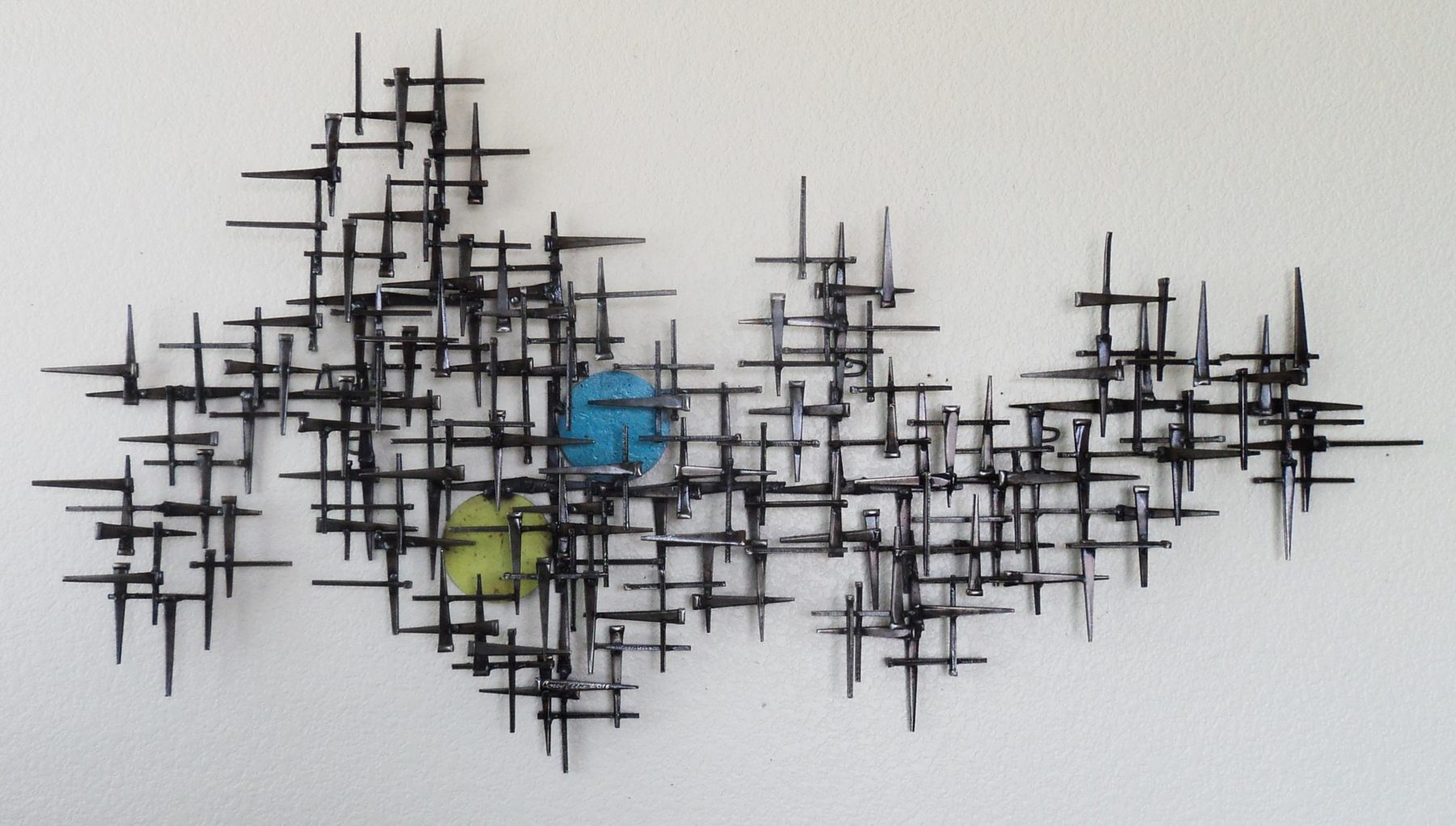 Studio welded metal sculpture by Corey Ellis