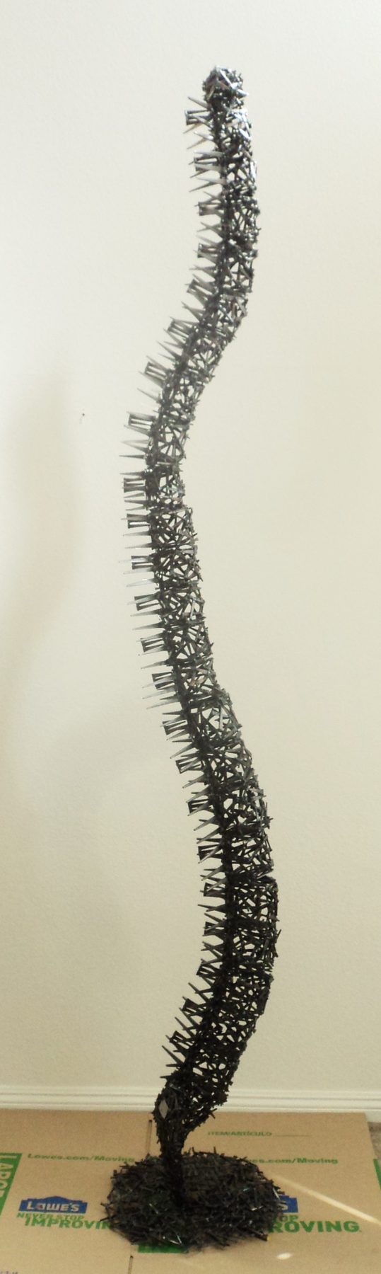 Studio welded metal sculpture by Corey Ellis
