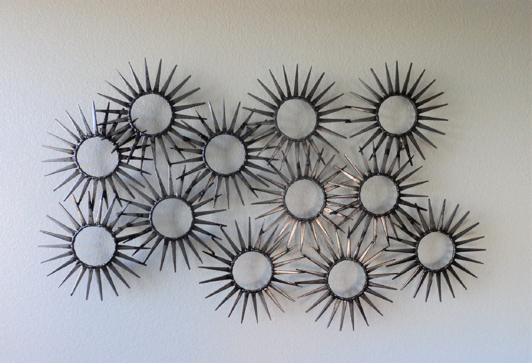 Mottier - welded metal sculpture by Corey Ellis