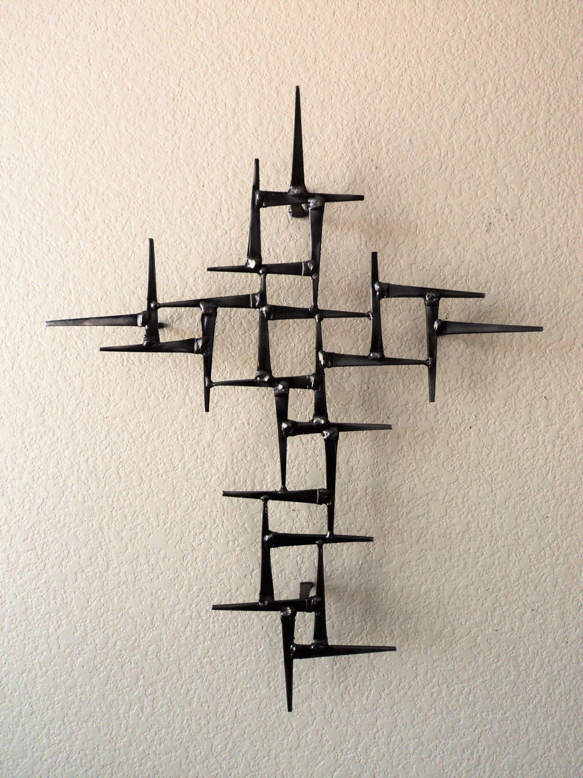 Sacrifice - welded metal sculpture by Corey Ellis