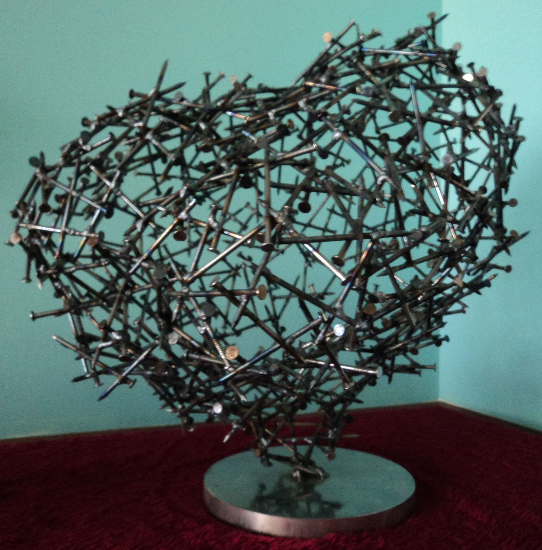 Heart - welded metal sculpture by Corey Ellis