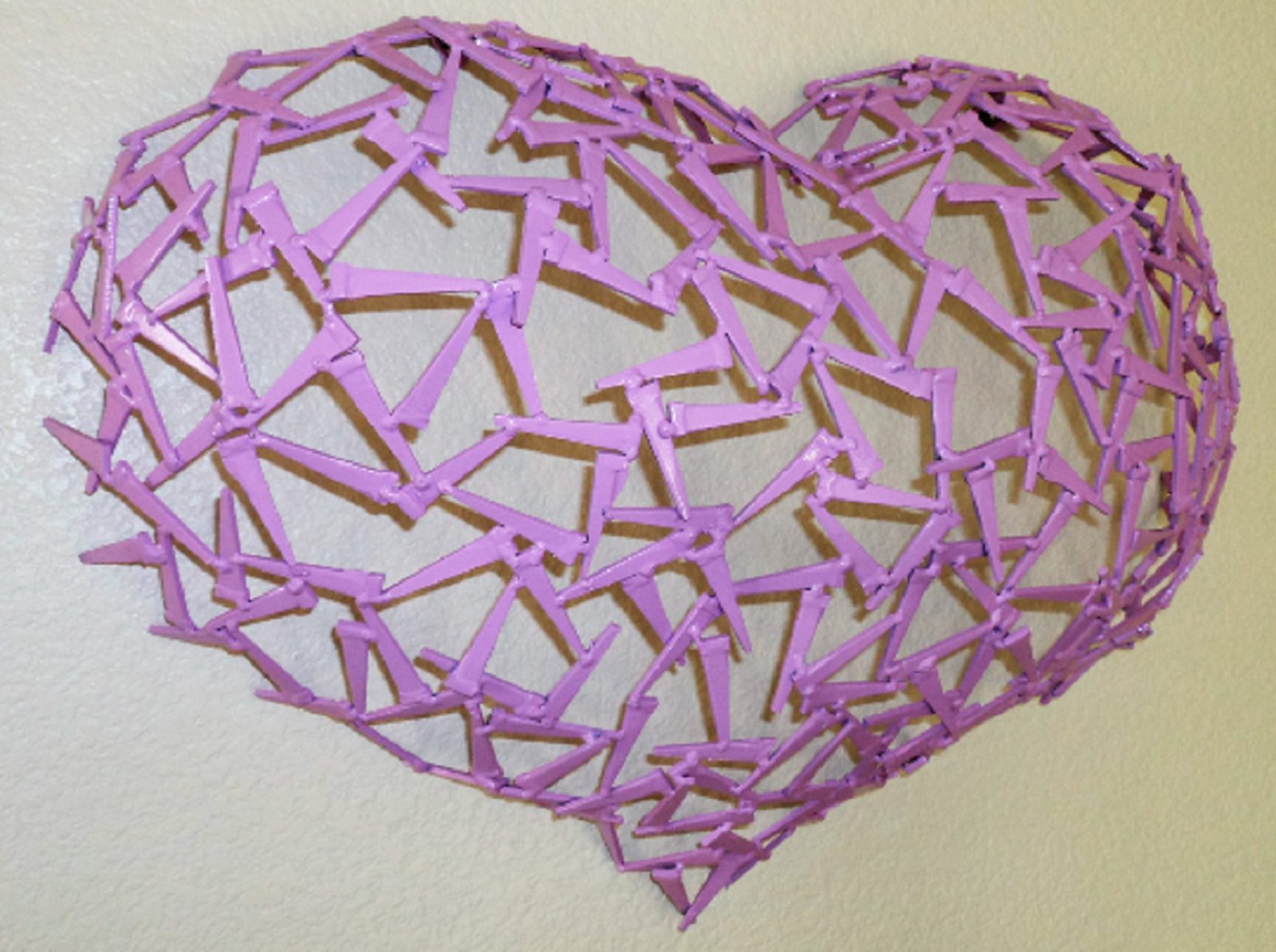 Millennium Heart - welded metal sculpture by Corey Ellis