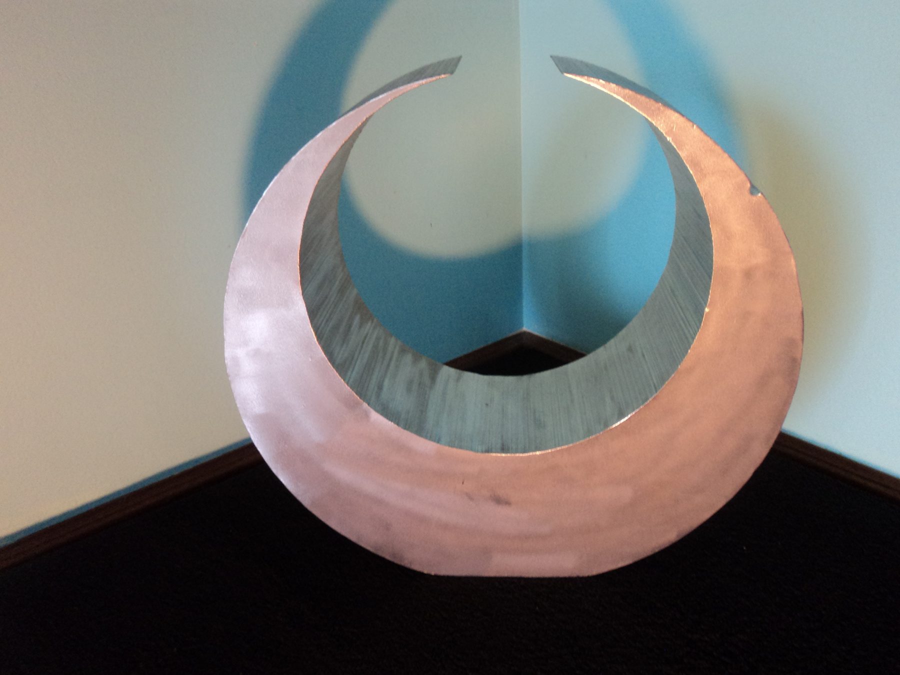 Ultra modern welded metal wall sculpture by Corey Ellis