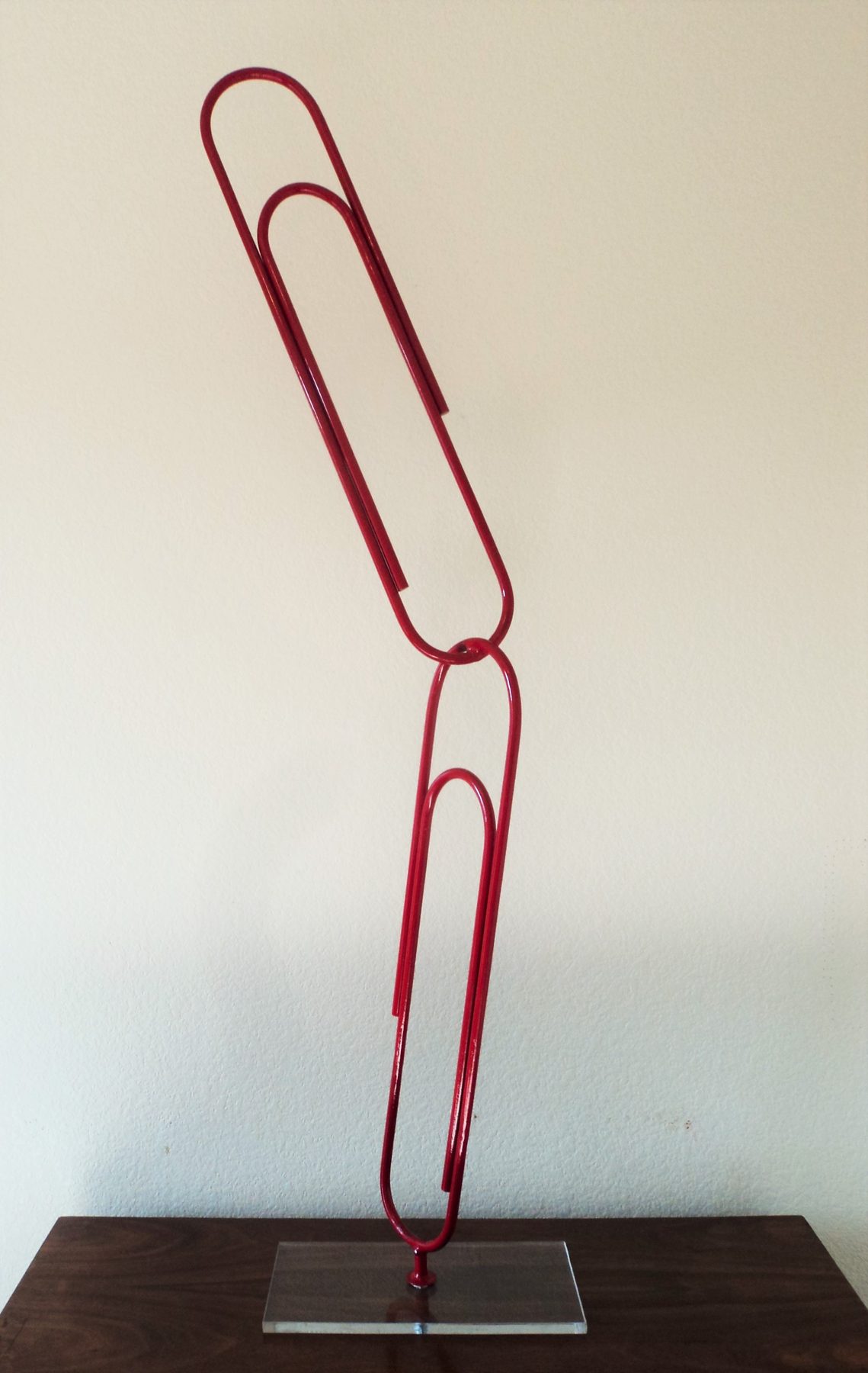 Ultra modern welded metal sculpture with flowing forms