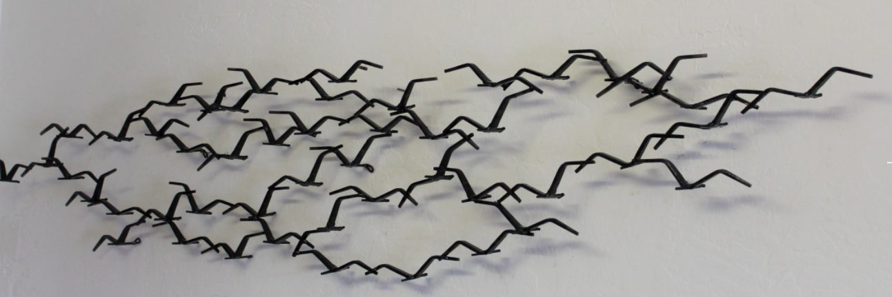 Row of stylized metal birds - modern wall sculpture by Corey Ellis