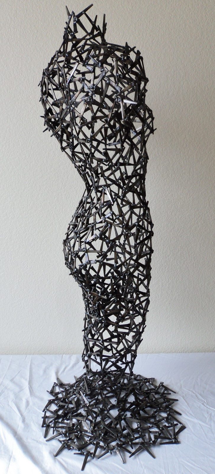 Bella, contemporary figurative metal sculpture by Corey Ellis