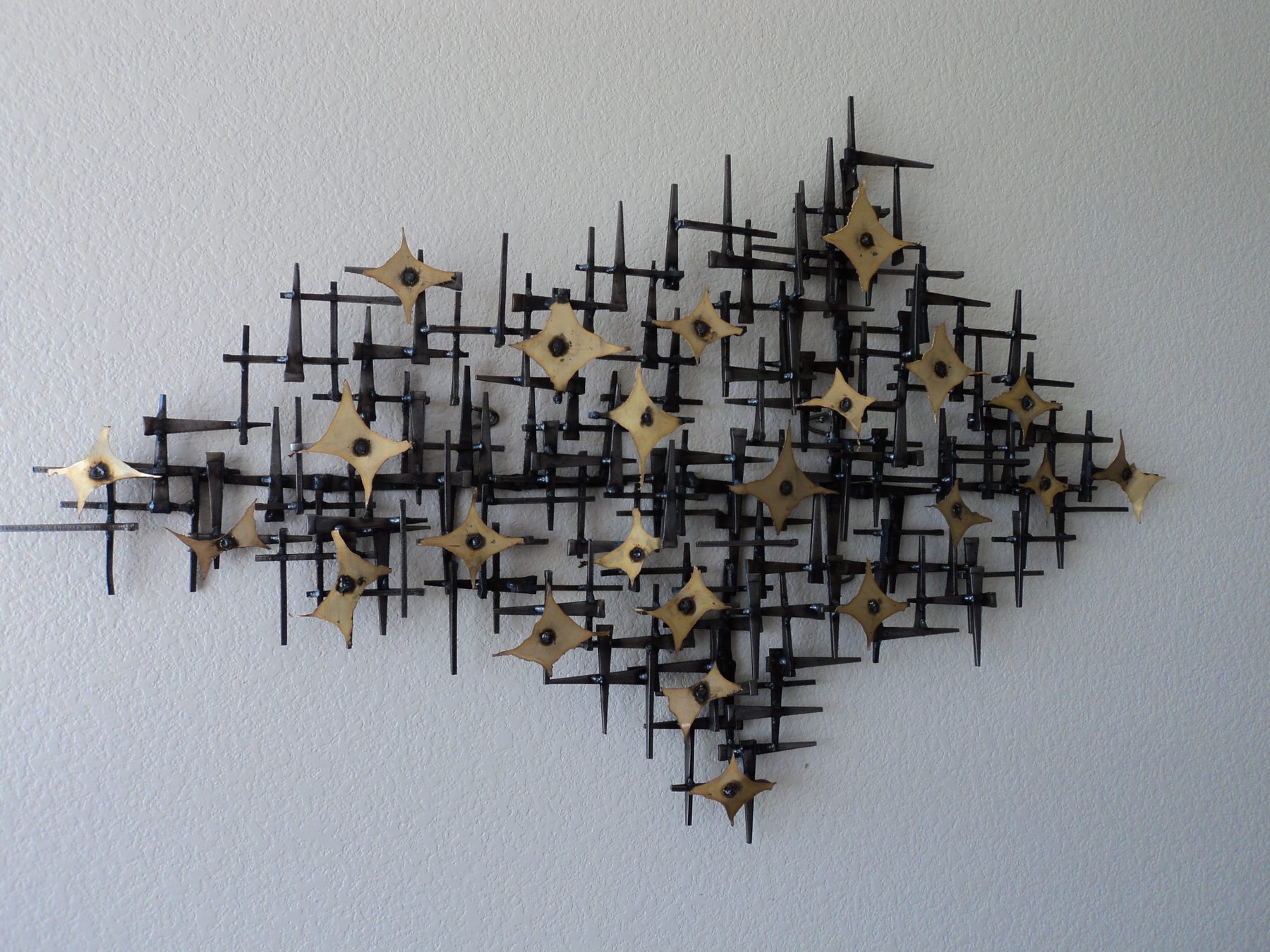 Starry Night - mid-century welded steel and brass wall sculpture by Corey Ellis